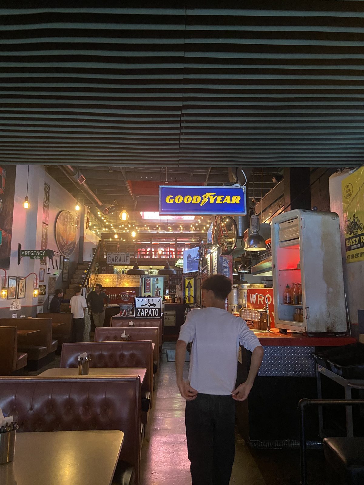 Ben Nisevich in a garage-themed diner